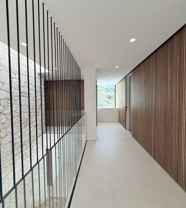 Resa Estates Can Furnet Ibiza te koop sale modern villa sea dalt villa views halllway 7.jpeg